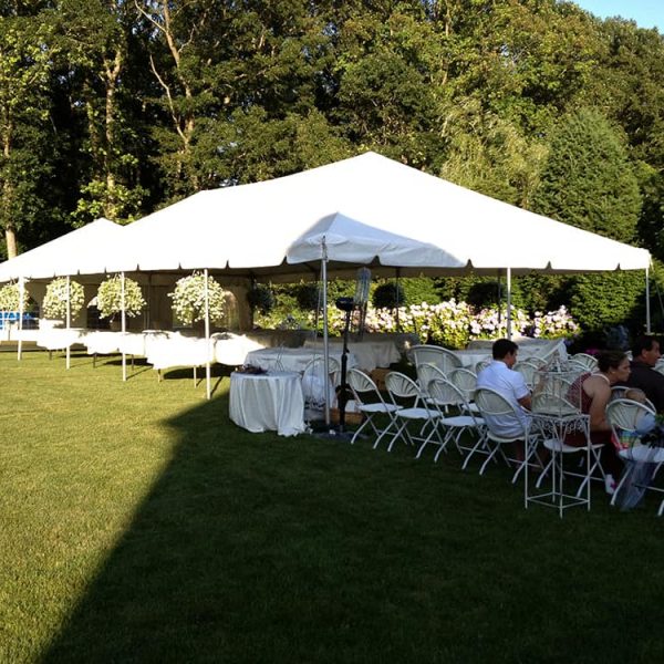 grass setup of tent rental with chairs grass setup of tent rental with chairs